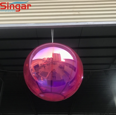 Inflatable pink hanging mirror ball